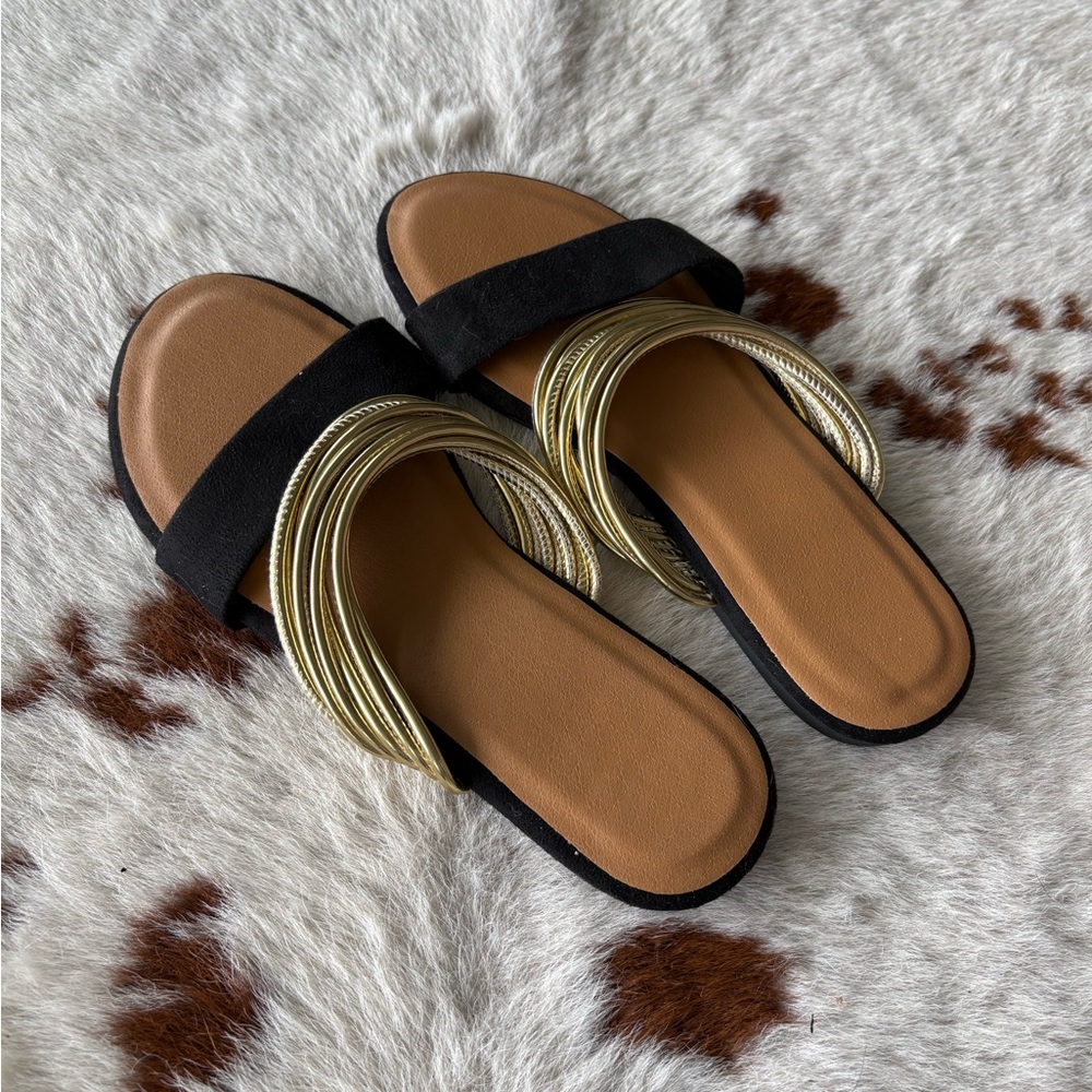 Elegant Black and Gold Sandals - New and Unworn.
